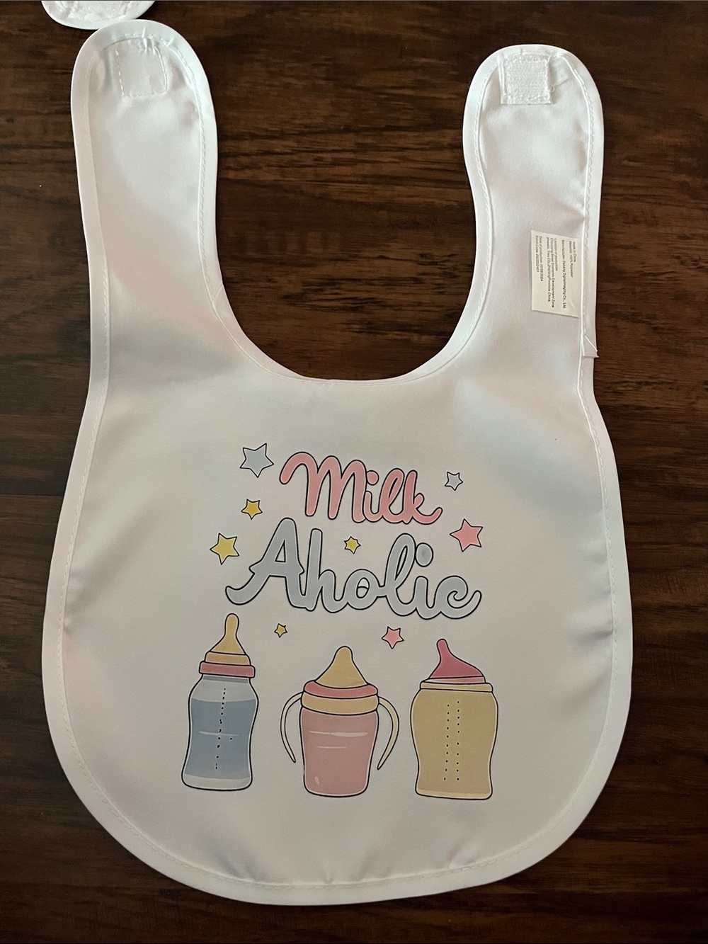 White Baby Bib with Pastel Bottle Prints - "Milk Aholic"